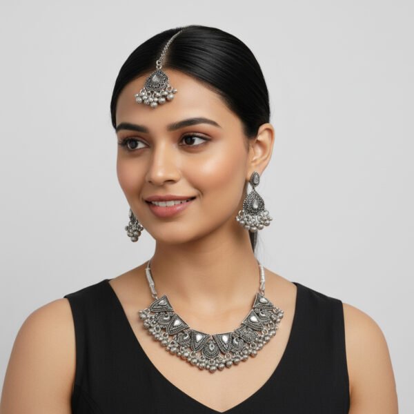 Oxidised Silver Choker Necklace Set with Earrings & Maang Tikka image2 Oxidised Silver Choker Necklace Set with Earrings & Maang Tikka