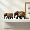 black and gold elephant image 1 Handcrafted Wooden Elephant Figurine Set with Stone Work – Black & Gold Royal Home Decor