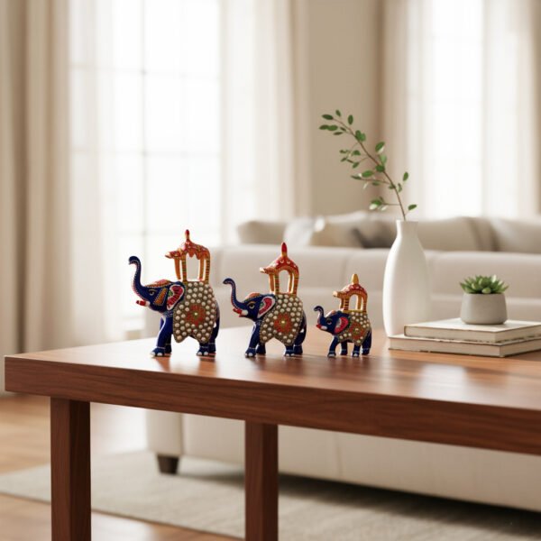 metal Ambabari image 1 Handcrafted Blue Metal Ambabari Elephant Figurines – Set of 3 | Decorative Royal Elephants with Pearl Work & Enamel Detailing