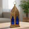 Moroccan Metal Decorative Lantern – Gold Tea Light Holder with Colored Glass Blue Small Moroccan Metal Decorative Lantern – Gold Tea Light Holder with Colored Glass | Tabletop & Hanging Candle Lantern